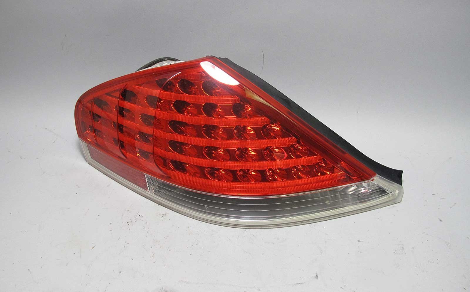 57_039a1f6b-1537-4ba6-adc2-7741d2f58900.jpg BMW E63 E64 6-Series Early Left Rear Outer Tail Light Drivers LED 2004-2007 USED - Image 1