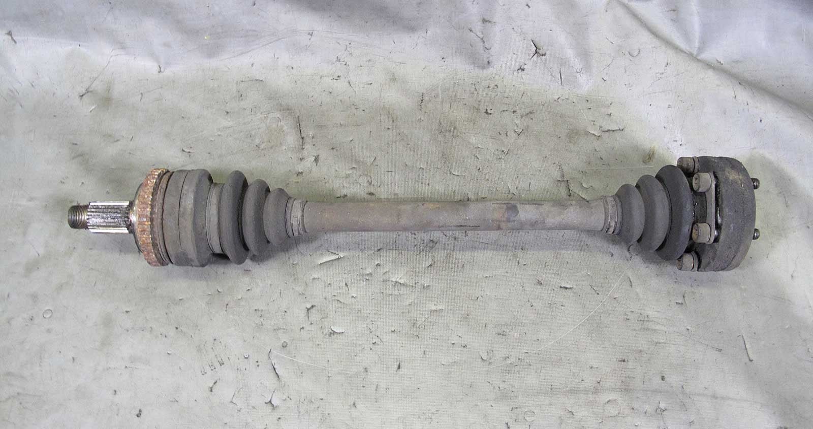 57_07504cfc-af1b-4ac7-ae20-f698d582d7bc.jpg BMW E30 325e 325ix Factory Rear Axle Output Half Shaft CV for ABS 1984-1991 - Image 1