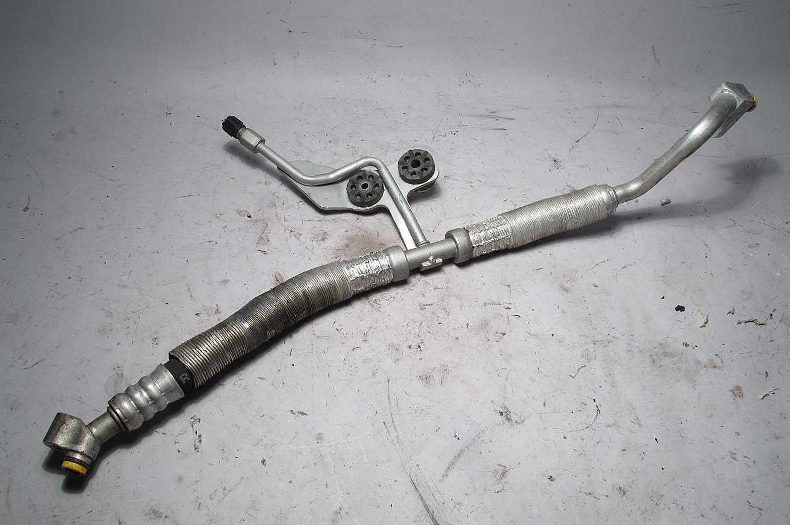 57_1d32ed84-ac48-45f1-9c71-816cb1999817.jpg BMW N62 4.4L V8 AC Hose Compressor to Evaporator Firewall 2004-2007 USED OEM - Image 1