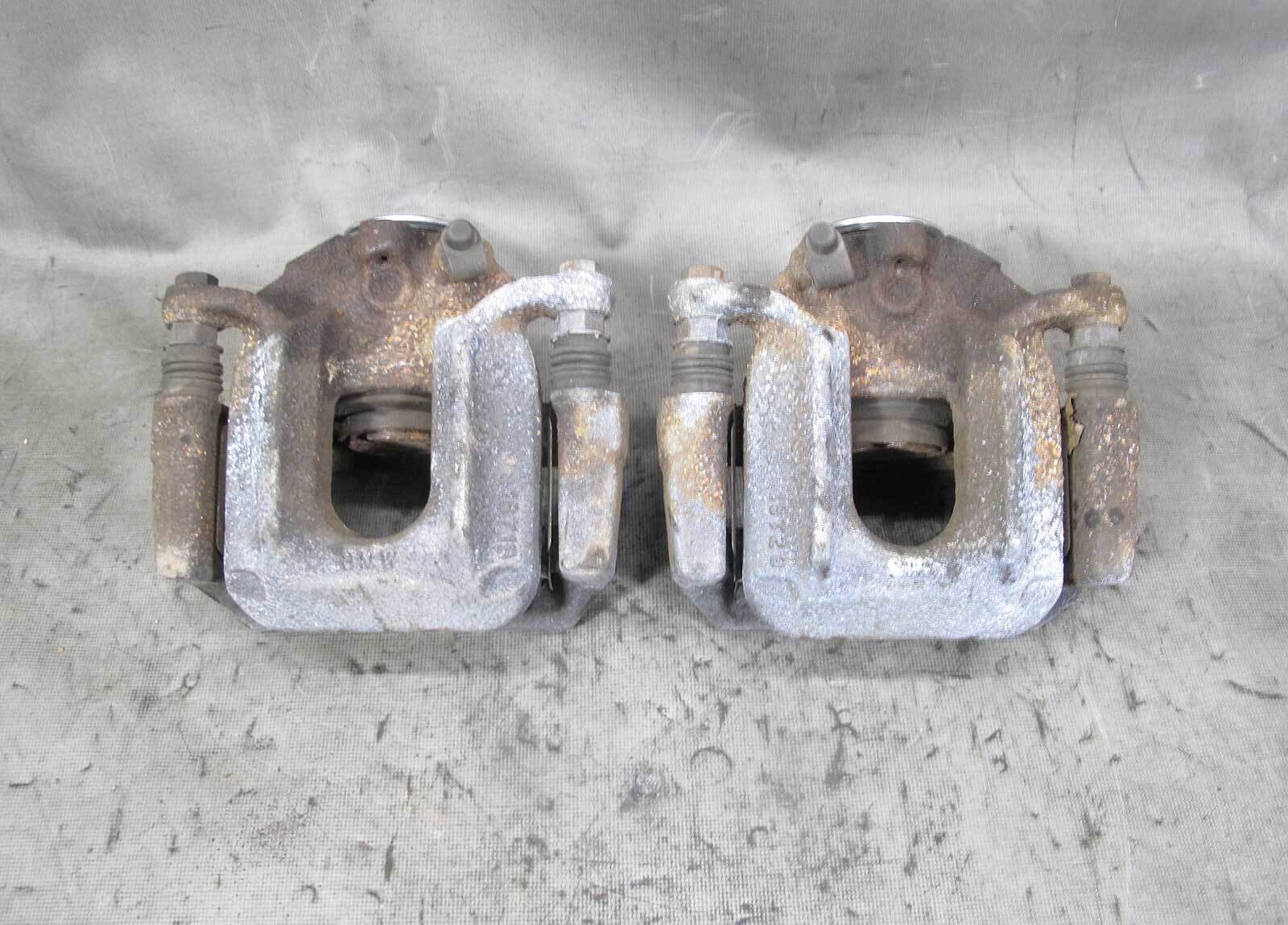 57_215136c4-88d9-47fe-9c66-60425d5768d3.jpg 2011-2017 BMW F25 X3 F26 X4 Rear Axle Brake Caliper Pair w Brackets OEM - Image 1