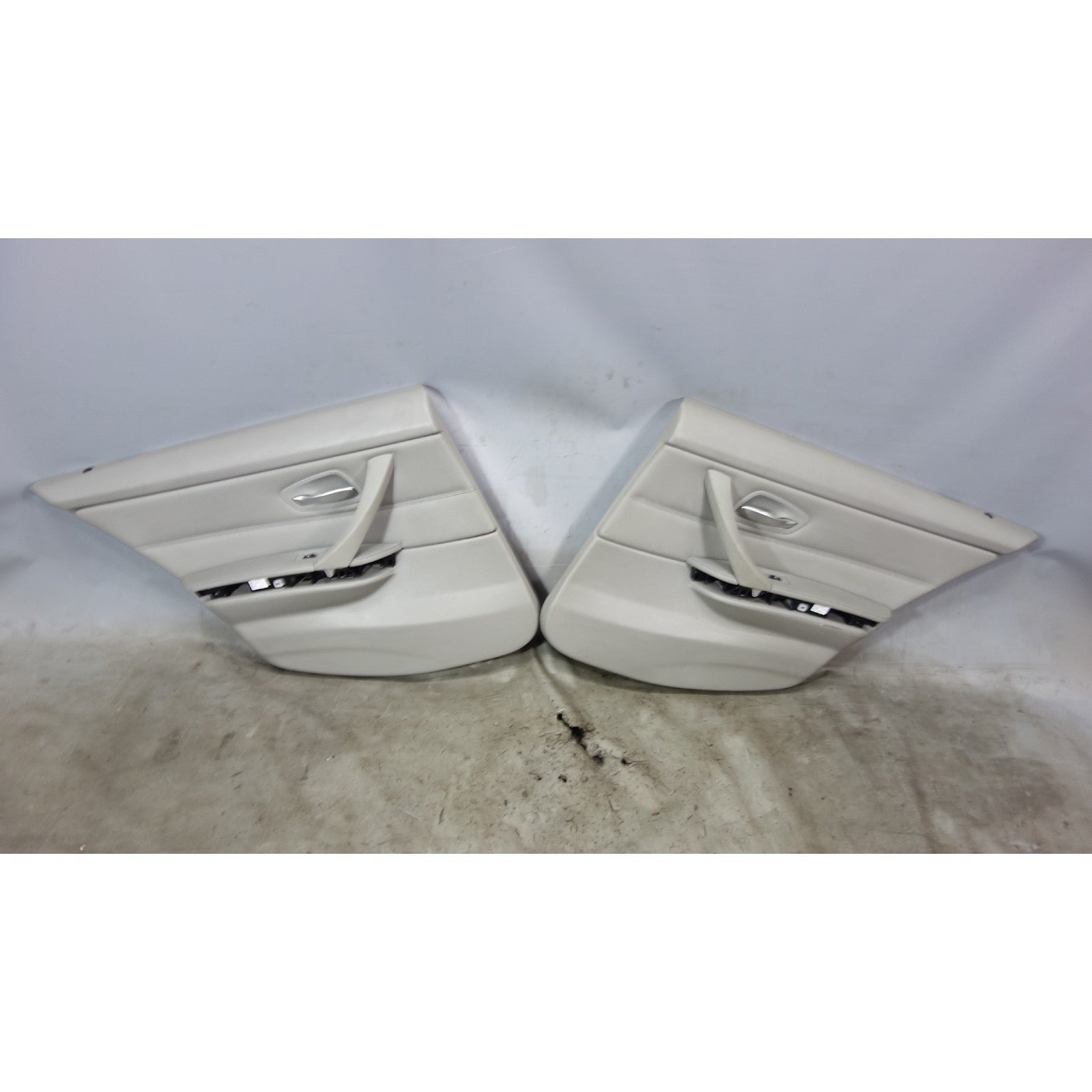 57_2bec7414-8192-4c22-a1bb-848a4db49395.jpg 2008-2012 BMW E90 3-Series Sedan Rear Interior Door Panels Grey Leather OEM - Image 1
