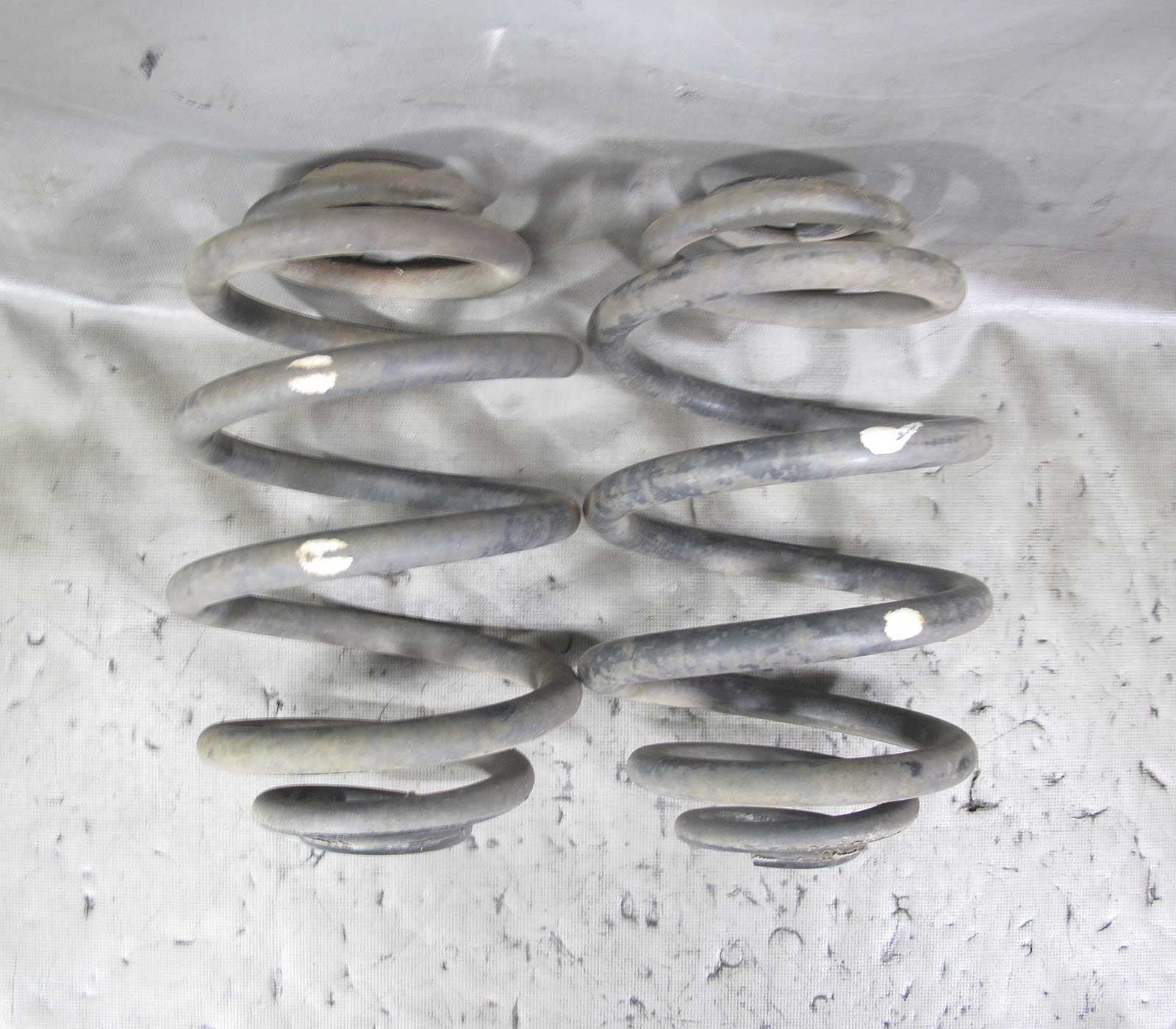 57_3b30cd88-d61a-478e-9ade-65c646528ccd.jpg 1996-1998 BMW Z3 1.9 Roadster M44 4-Cyl Factory Rear Axle Coil Barrel Springs OE - Image 1