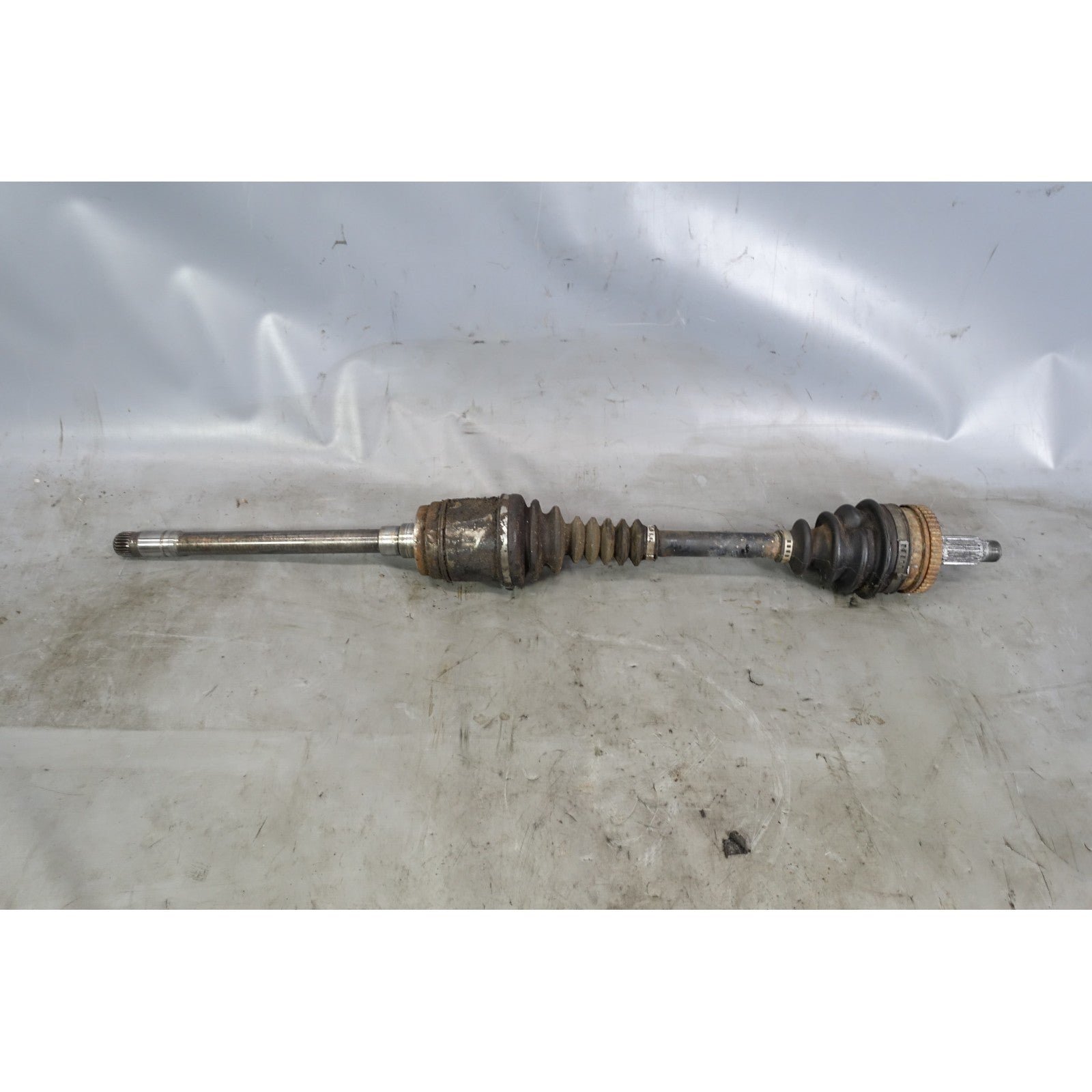 57_460470db-153c-44c9-a25a-f08c9a0538e6.jpg Damaged 1988-1991 BMW E30 325ix AWD Right Front Output Axle Shaft CV Factory OEM - Image 1