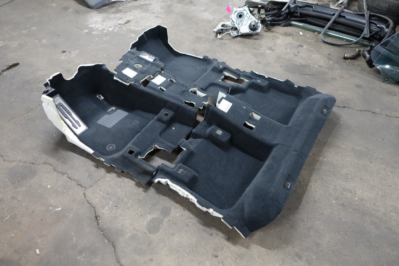 57_5b1562ea-e0e4-4d3b-adaf-ed79c1345974.jpg Damaged 2019-2024 BMW G01 X3 F97 Factory Floor Covering Carpet Set Black OEM - Image 1