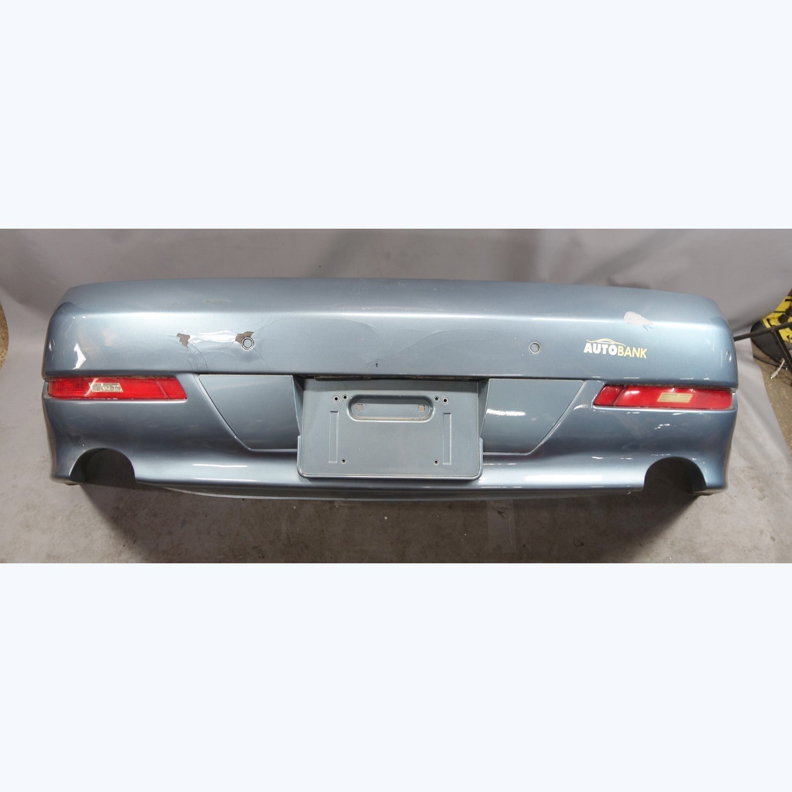 57_5cab43ae-0663-4e29-a81b-0d02c2164cc1.jpg Damaged 2008-2010 BMW E63 E64 650i Rear Bumper Cover Trim PDC Atlantic Blue OEM - Image 1