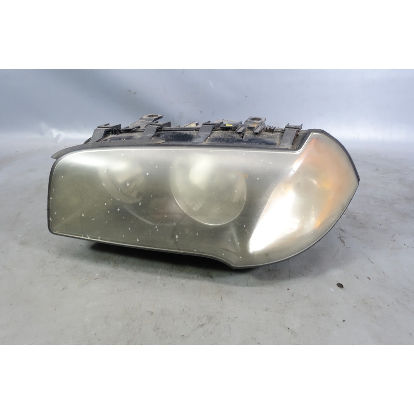 57_65e4bcd1-6468-426c-ab1f-03d2a91f5f3e.jpg 2004-2006 BMW E83 X3 SAV M54 Early Left Factory Halogen Headlight Lamp OEM - Image 1