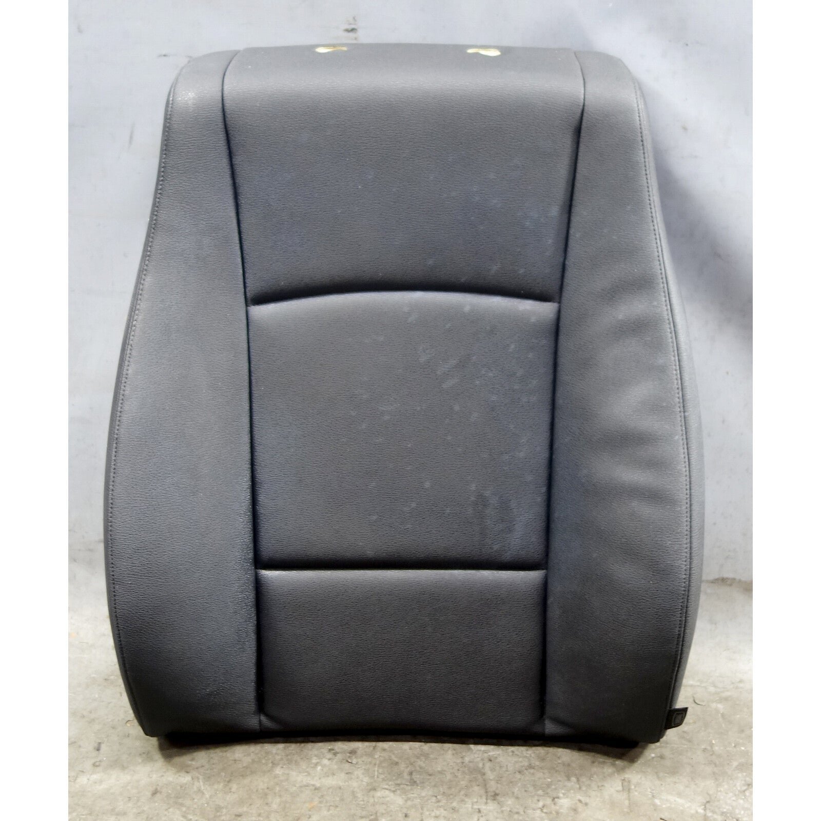 57_881aca9e-bfaf-46be-a4af-6a9f142f6199.jpg DAMAGED 2013-2015 BMW X1 SAV Front Right Seat Backrest Cushion Black Vinyl OEM - Image 1