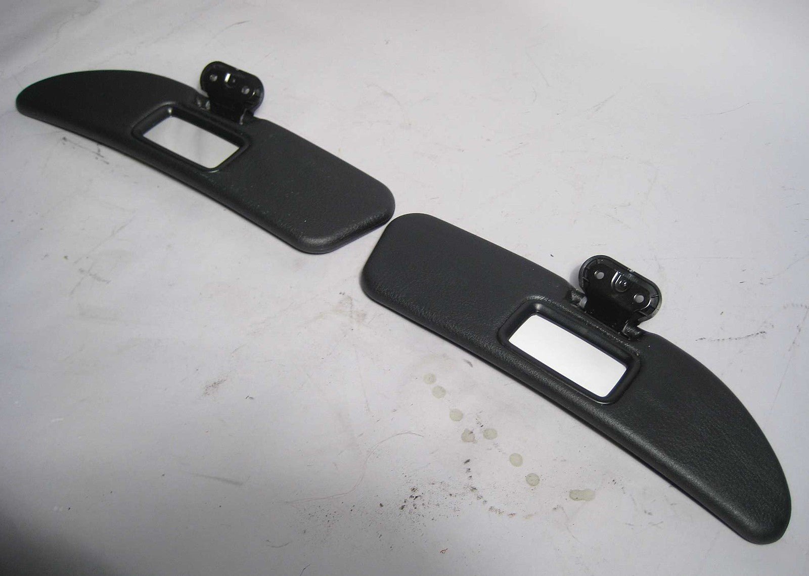 57_88d3fc8f-8400-4310-ae23-24a34a836c70.jpg 1997-2002 BMW Z3 Roadster Black Vinyl Sun Visor Pair Left Right OEM - Image 1