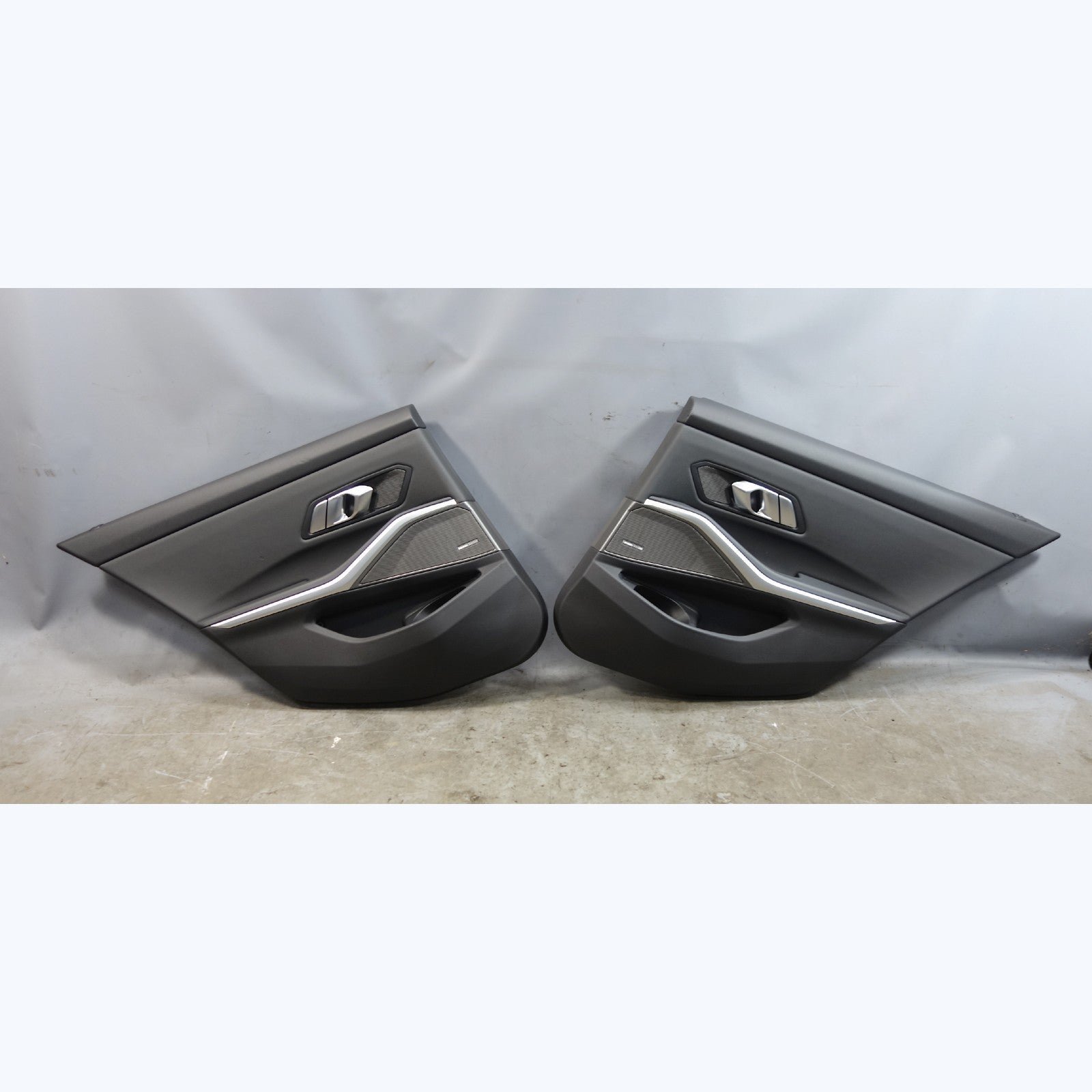 57_90fc9a32-fd97-4bce-b239-6a2bfe640f8a.jpg 19-22 BMW G20 3-Series Rear Interior Door Panel Card Trim Pair Black Vinyl OEM - Image 1