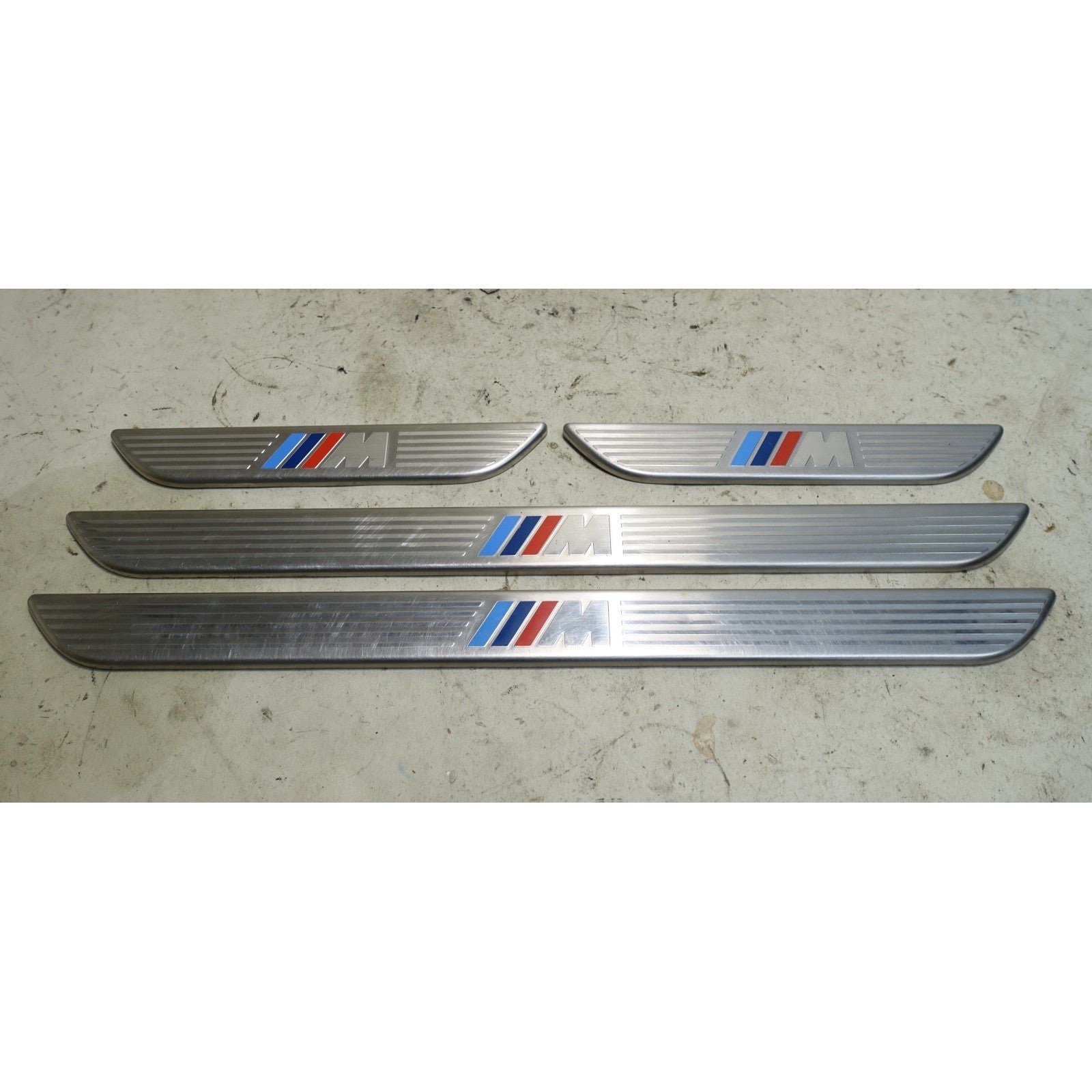 57_94ea3f11-3156-463c-b0f1-948eb16aae60.jpg 2007-2014 BMW E70 X5 E71 X6 Factory ///M Door Sill Entry Trim Cover Set OEM - Image 1