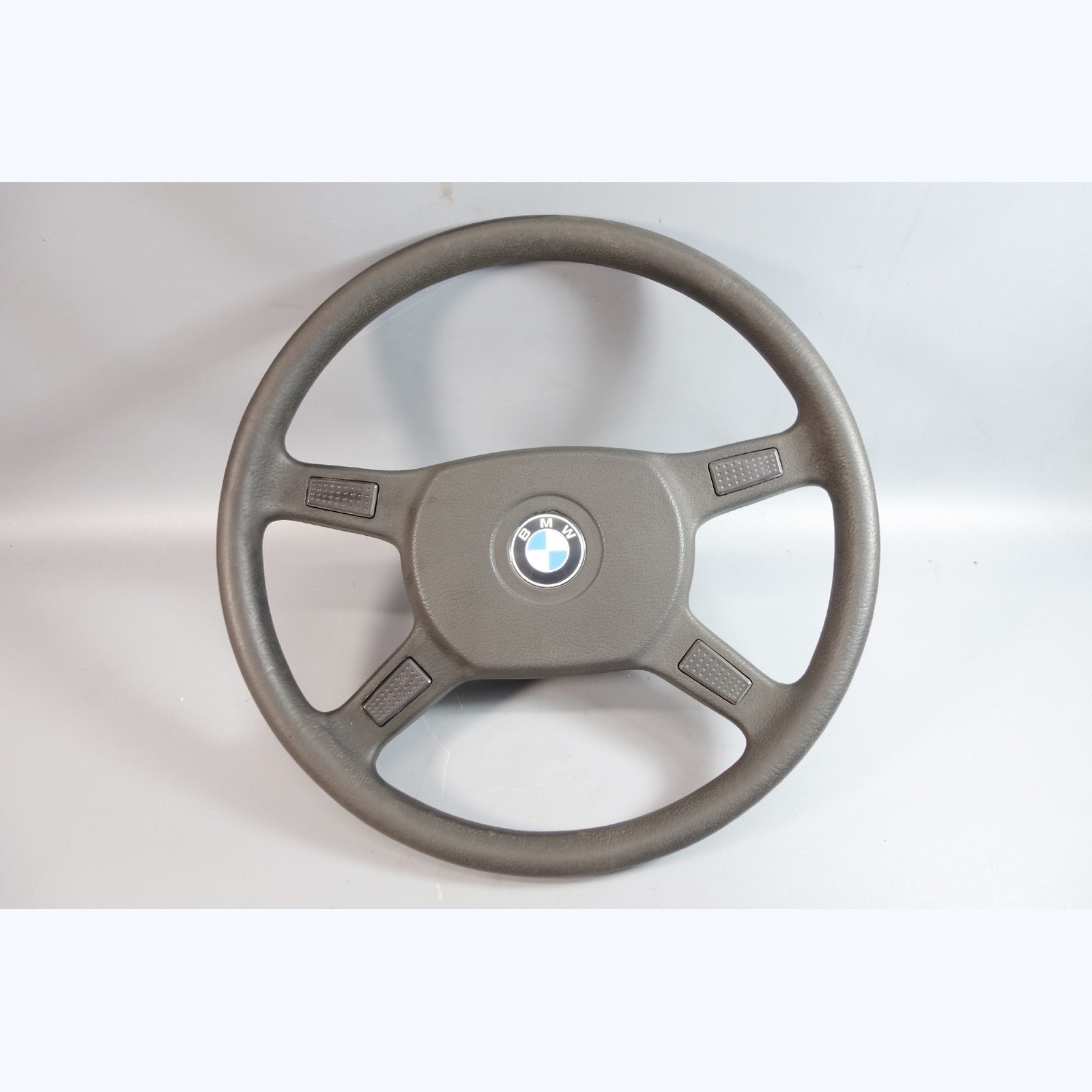 57_9797b6af-3c7f-4e77-b92b-8cbefd4cbecc.jpg 1984-1993 BMW E30 3-Series Standard Vinyl Steering Wheel 4-Spoke OEM - Image 1