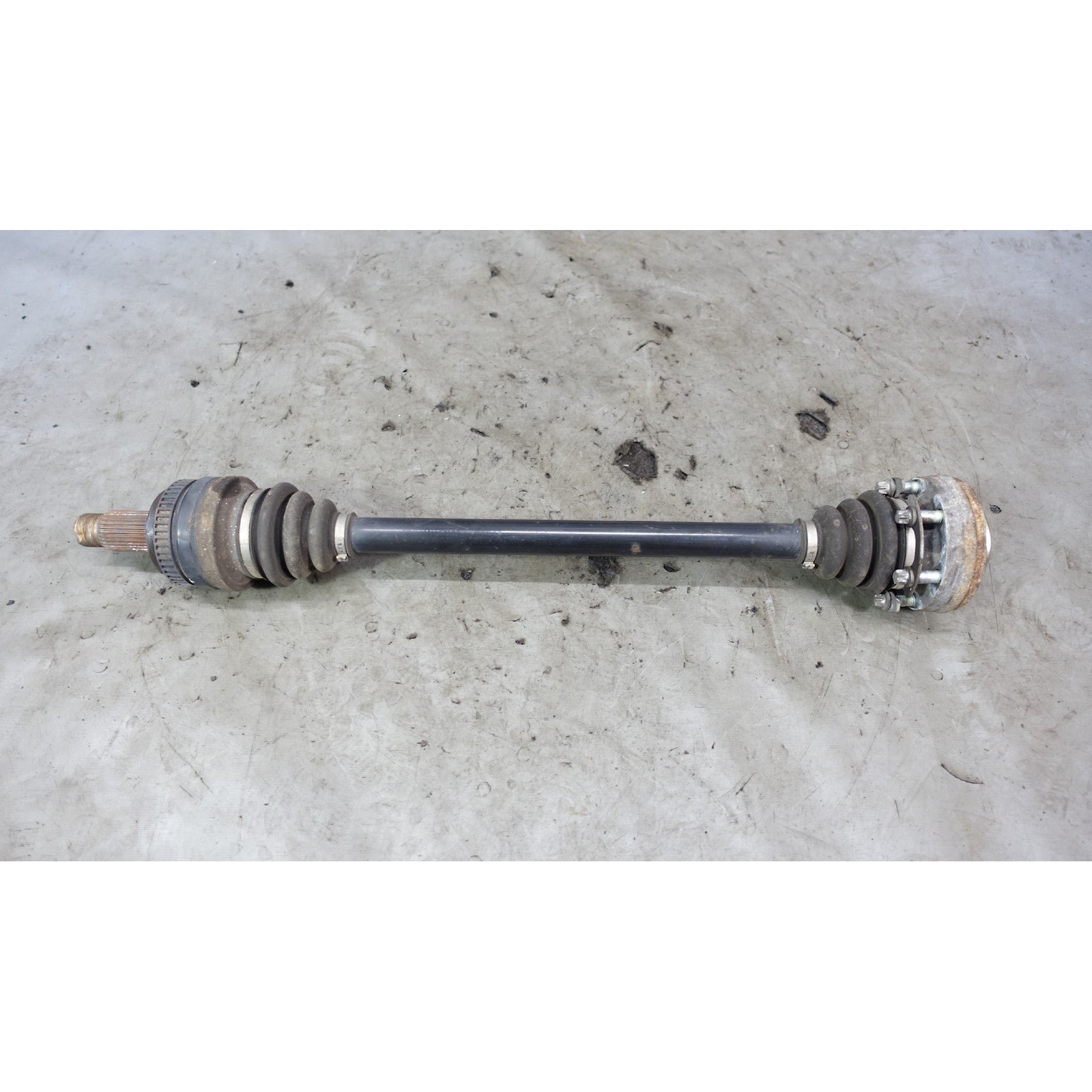 57_a270c076-bc77-4a89-a05b-5d66e8c0f5bc.jpg 04-06 BMW E83 X3 SAV Right Rear Output Half Shaft for Manual Transmission OEM - Image 1