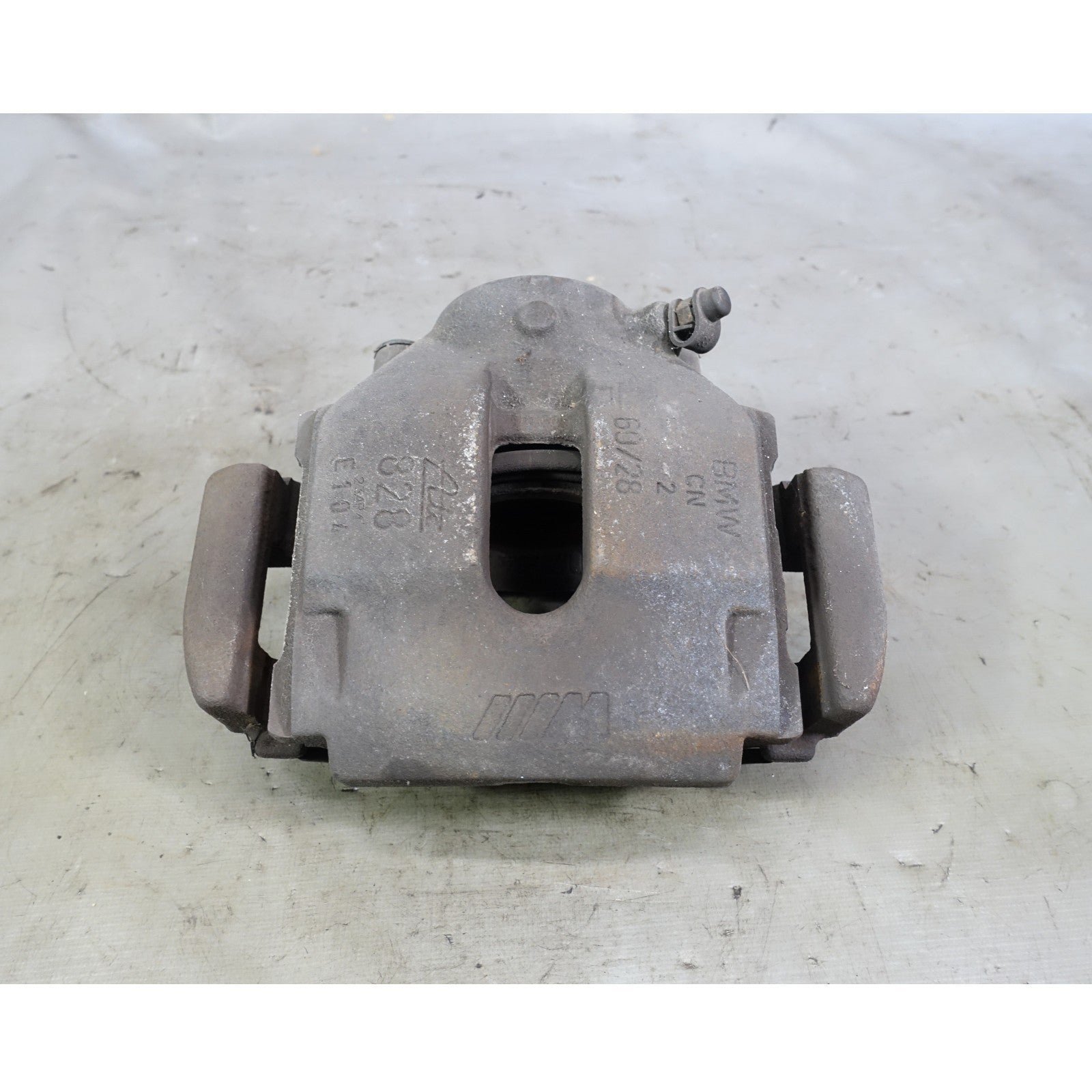 57_aea85f6a-ab0b-4776-9e05-7b305bd074d6.jpg Damaged BMW E46 M3 Factory Right Front Brake Caliper with Bracket 2001-2006 OEM - Image 1