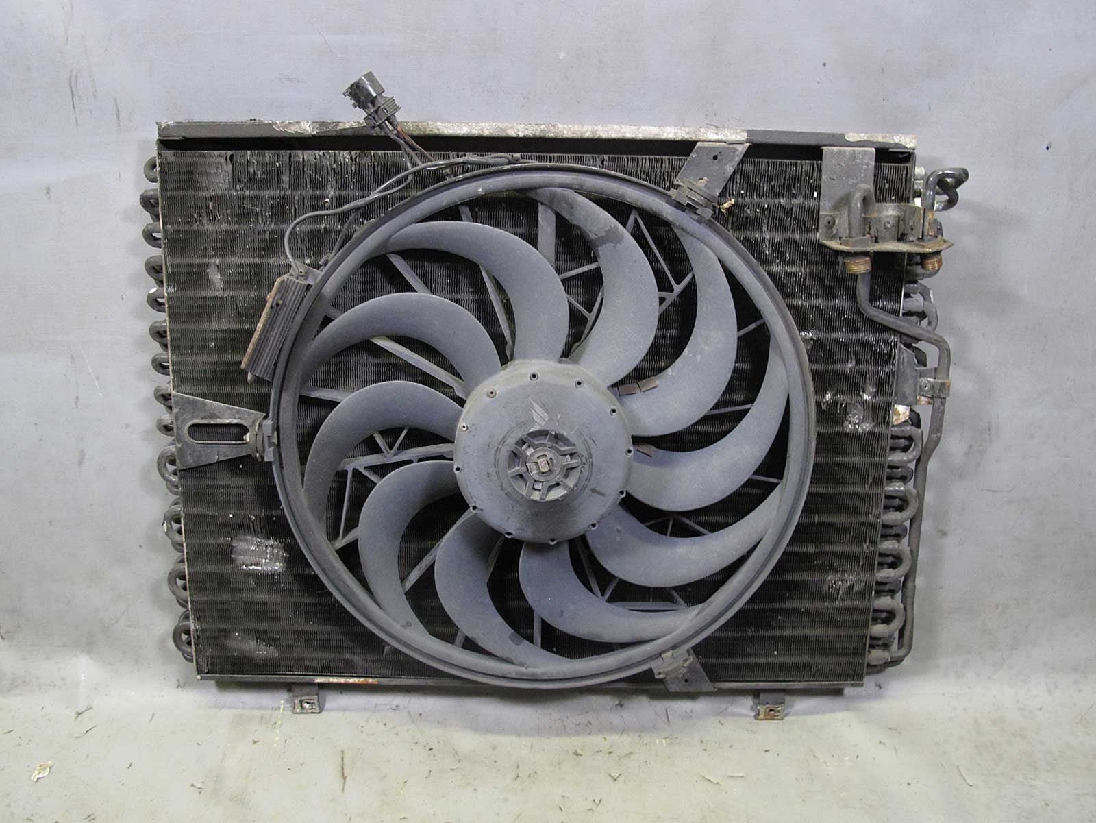 57_c82c6094-9008-4adb-862a-526c59bd1a6d.jpg BMW E34 5-Series E32 AC Condenser w Auxiliary Electric Pusher Fan 1988-1995 USED - Image 1
