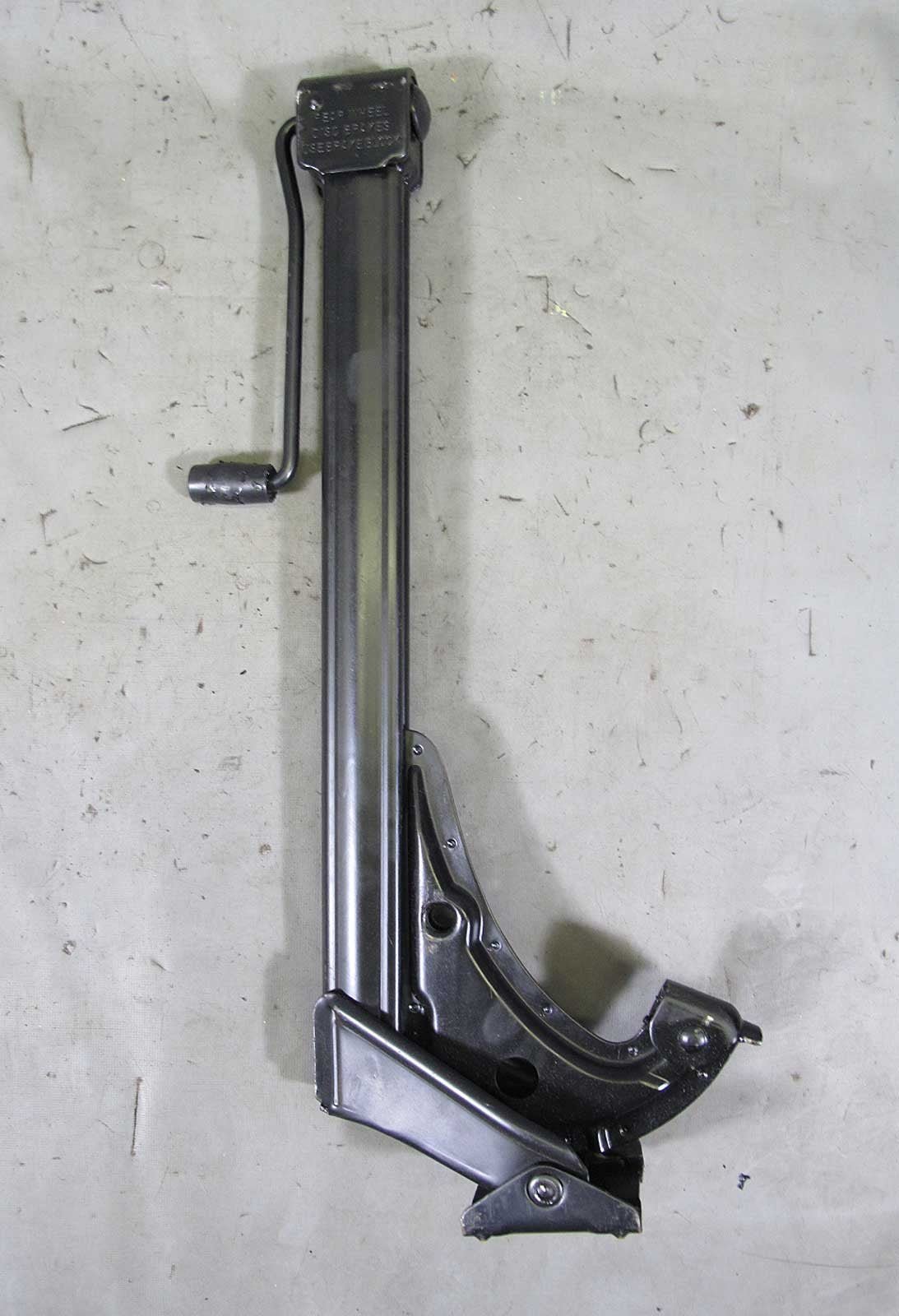 57_cb08c1c7-d34d-4e60-8f72-e53ea65b8383.jpg BMW E34 5-Series Factory Spare Tire Lifting Jack Trunk Tool 1989-1995 USED OEM - Image 1