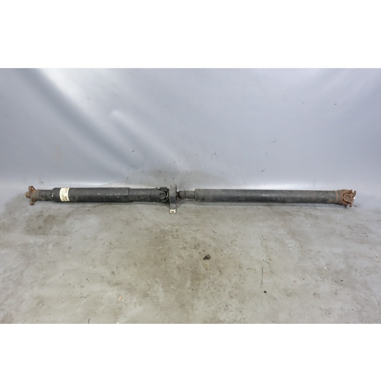 57_cfa1de78-8d8e-45cd-82f8-3b7ce182ad1f.jpg BMW E46 323i 325i 5 Speed Manual Drive Propeller Shaft CSB 1999-2006 OEM - Image 1