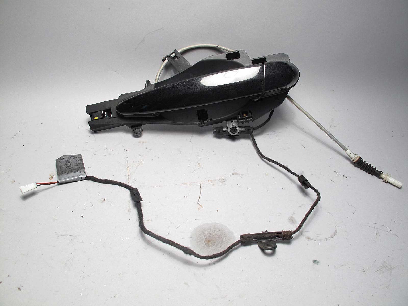 57_df41d084-8031-460e-be5e-45780e821e3e.jpg BMW E90 E91 3-Series Left Rear Exterior Door Handle Light Black 2006-2012 USED - Image 1