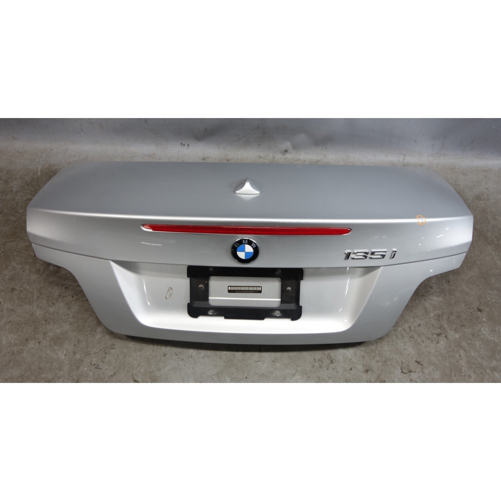 57_e60edb59-4ffd-410f-88ab-14358fe80fd8.jpg Damaged 2008-2009 BMW E88 1-Series Convertible Early Trunk Lid Titan Silver OEM - Image 1