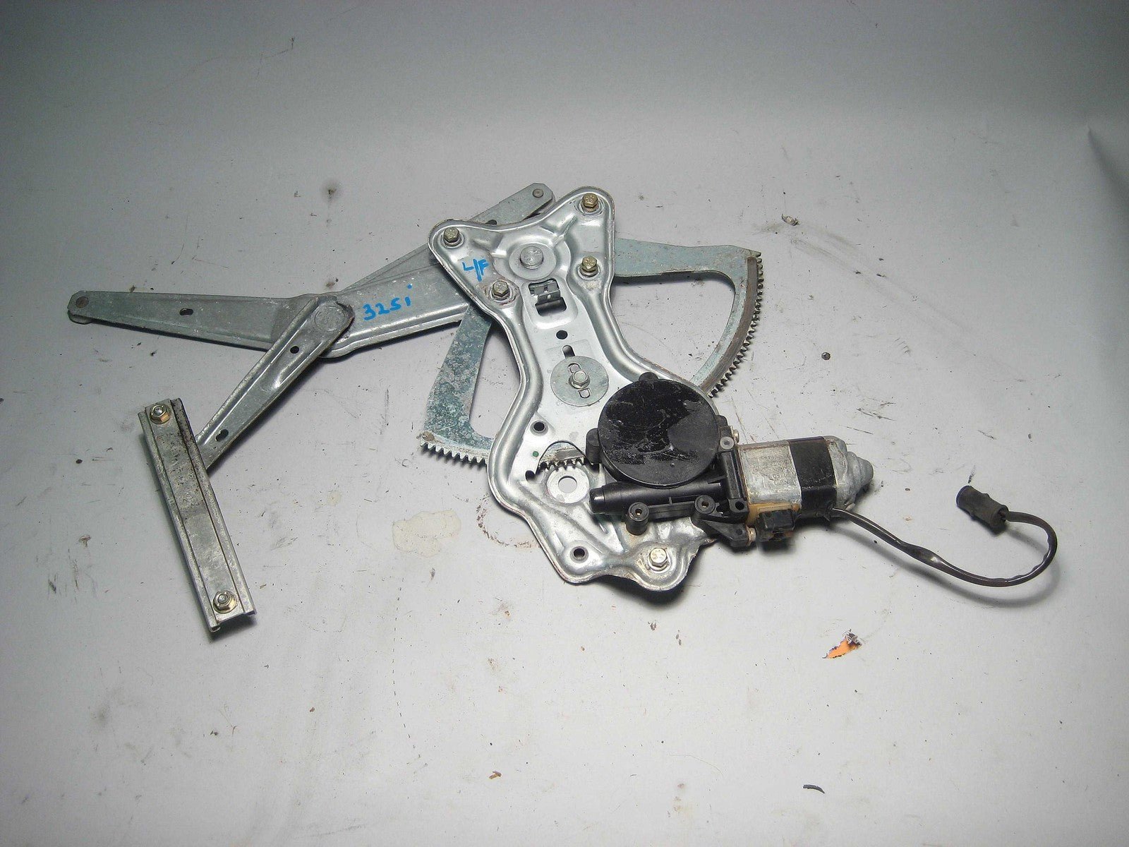 57_f146cf0c-106b-4342-874d-5e779151e575.jpg BMW E30 Coupe Sedan Left Front Window Regulator Lifter w Motor 3/88+ OEM - Image 1